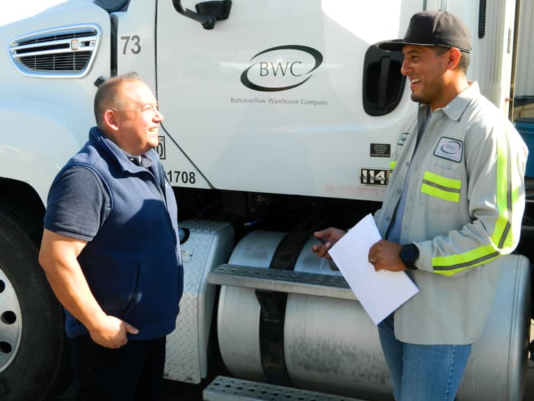 John Alindajao / Talking with a truck driver | Allies for Agriculture